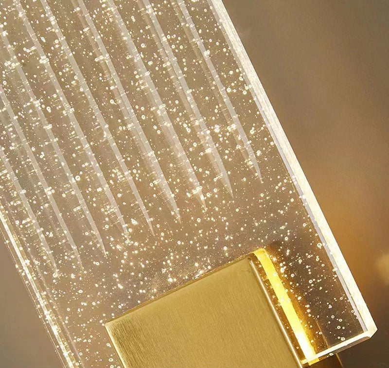 arandela de cristal led tricolor com esferas acesa na parede - foto 4