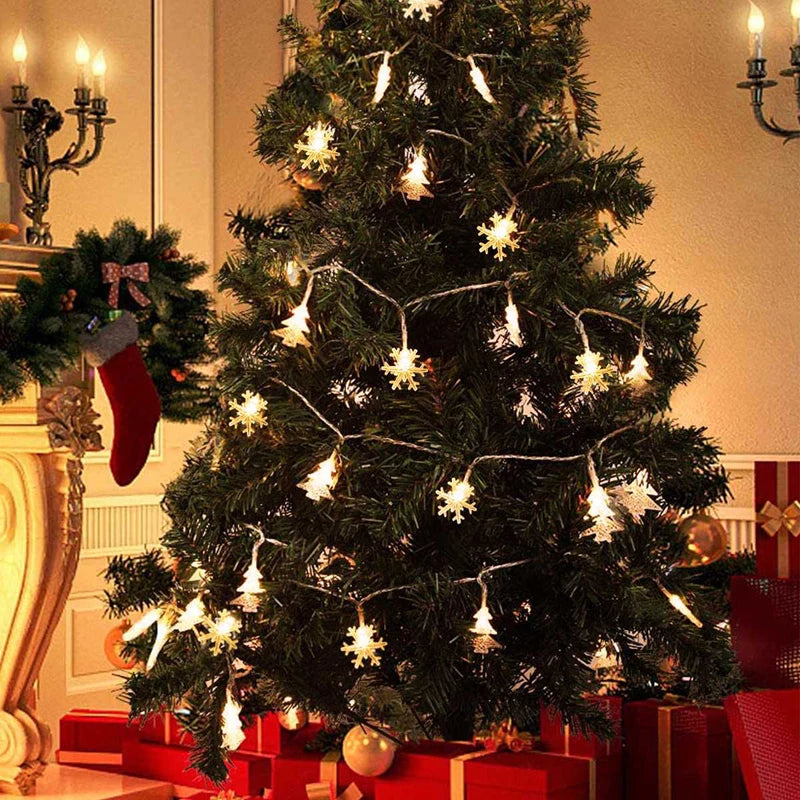 cordão de luzes de natal com figuras de árvores e renas - foto 10