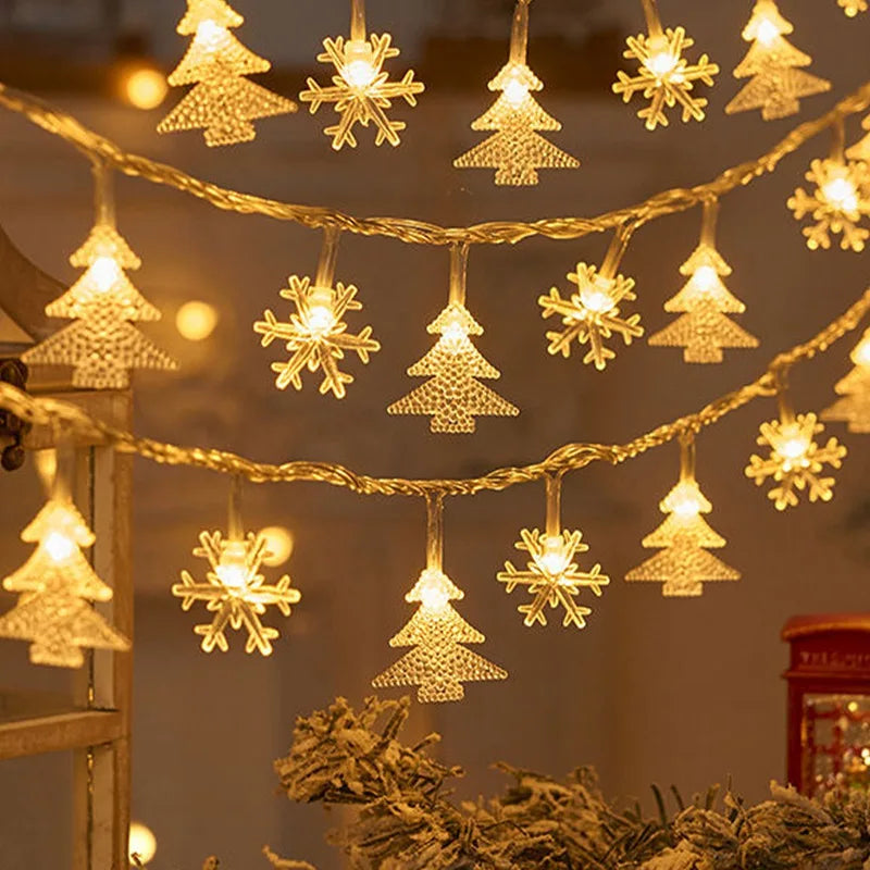 cordão de luzes de natal com figuras de árvores e renas - foto 13