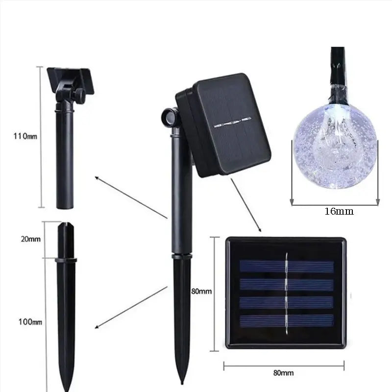 cordão solar de bolinhas de luz led branco quente aceso em jardim - foto 4