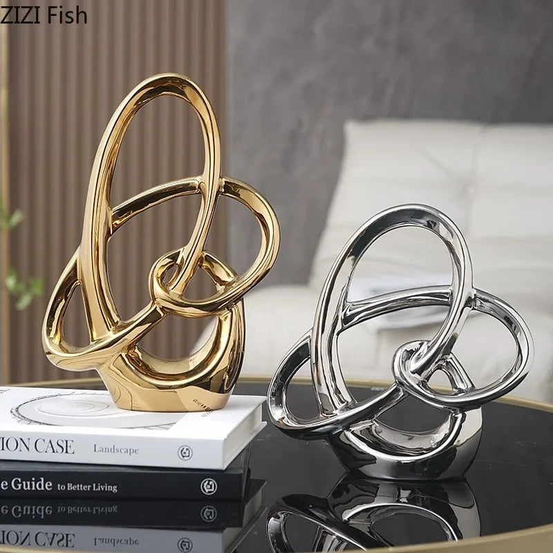 escultura anel em cerâmica esmaltada dourada - foto 2