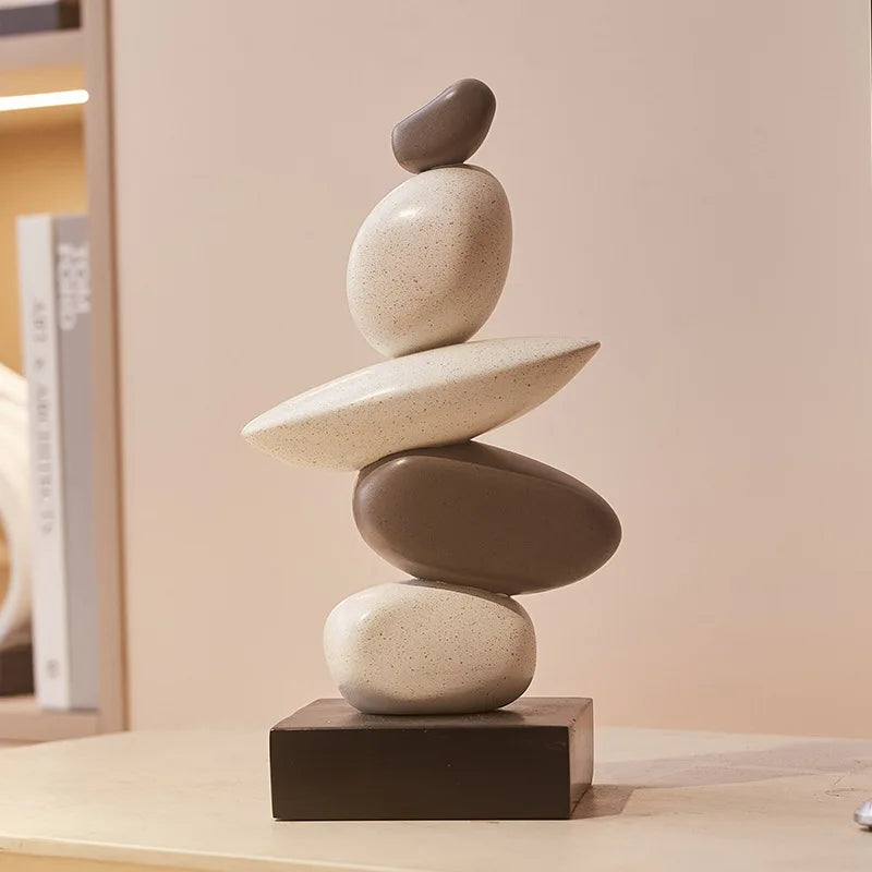 escultura equilíbrio em resina inspirada em pedras empilhadas - foto 3