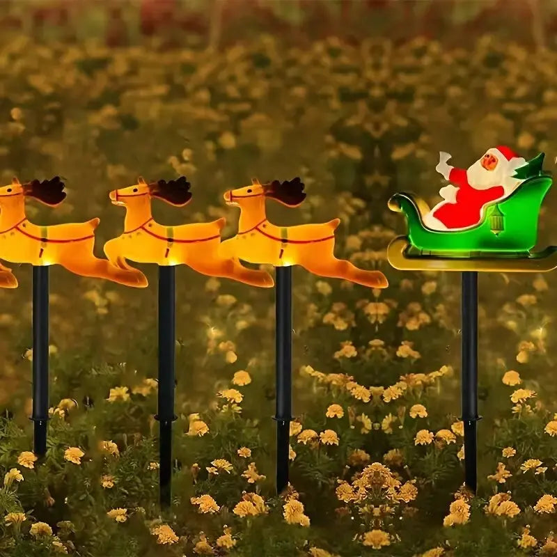 luzes solares de natal com papai noel e alce no jardim - foto 4