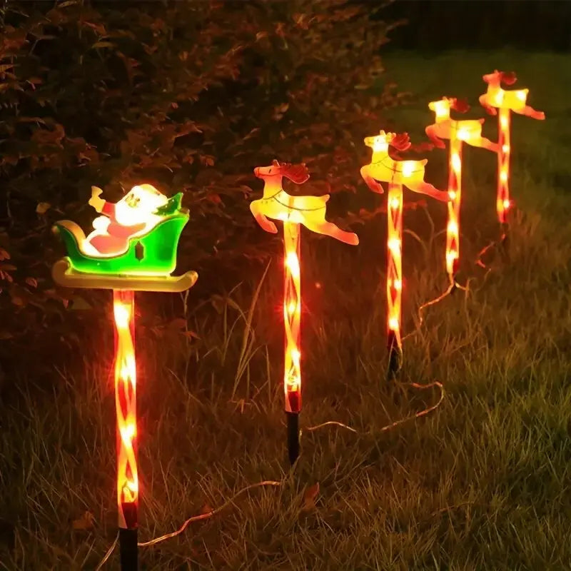 luzes solares de natal com papai noel e alce no jardim - foto 5