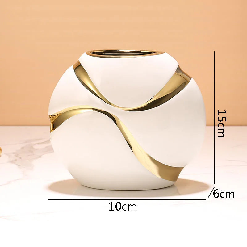 vaso de cerâmica com acabamento dourado - foto 2