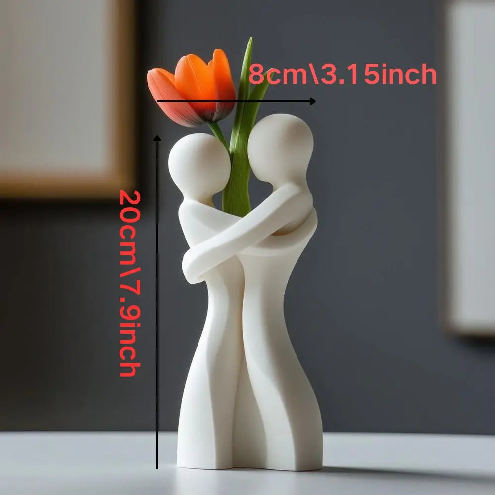 vaso decorativo de resina em formato de abraço e coração - foto 2