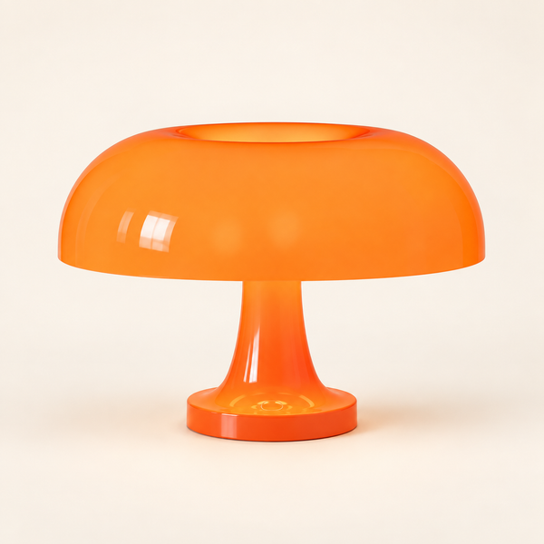 abajur cogumelo bauhaus laranja aceso sobre a mesa