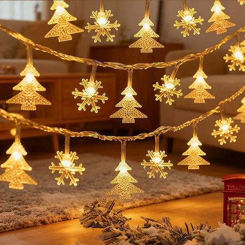 cordão de luzes de natal com figuras de árvores e renas