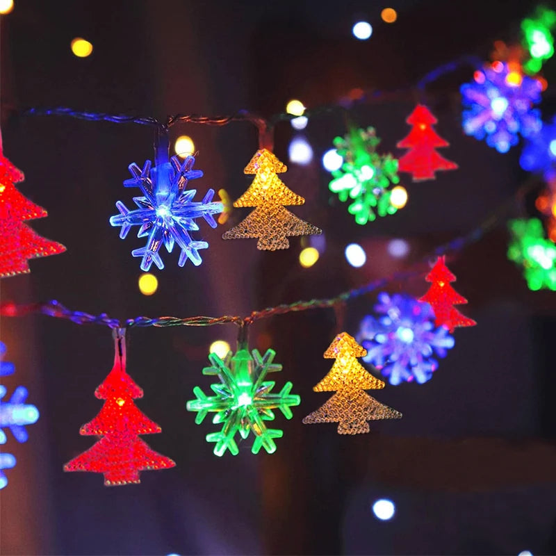 cordão de luzes de natal com figuras de árvores e renas - foto 6