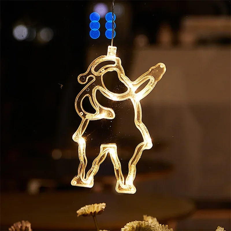 enfeite luminoso de natal em led com ventosa fixado na janela - foto 11