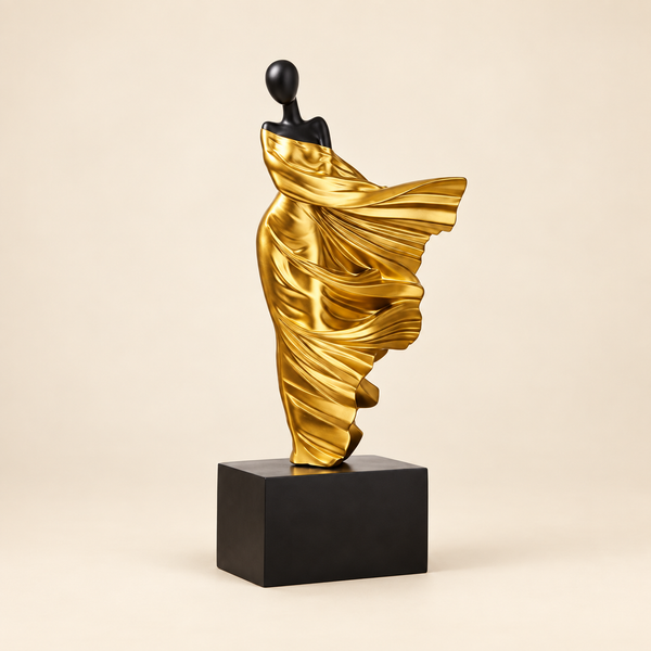 escultura abstrata feminina dourada em resina