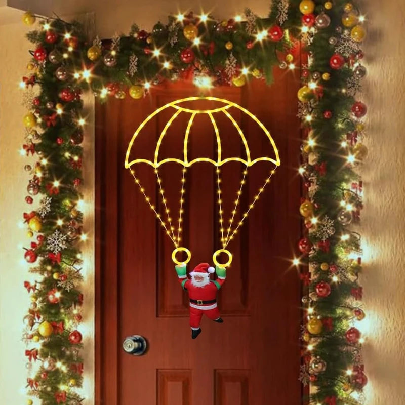 papai noel de paraquedas luminoso em led aceso na varanda - foto 2