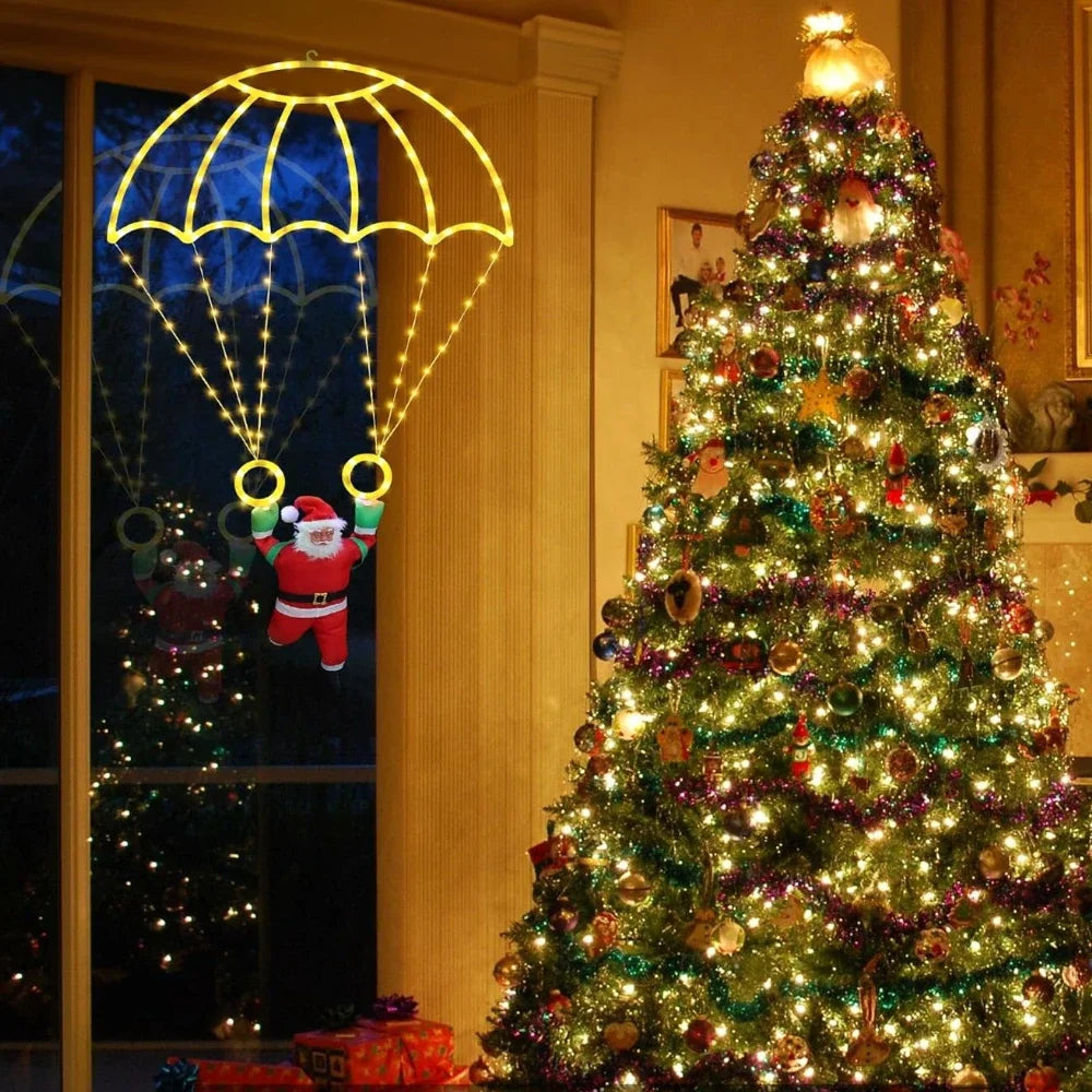 papai noel de paraquedas luminoso em led aceso na varanda - foto 3