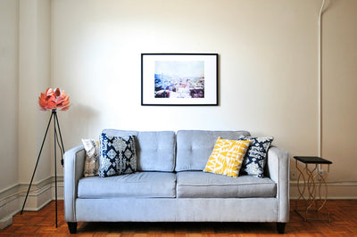 Sala sofa azul quadro